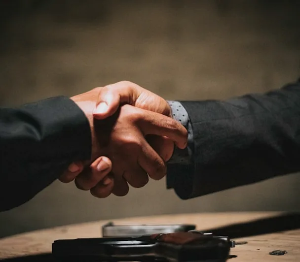 Team members shaking hands